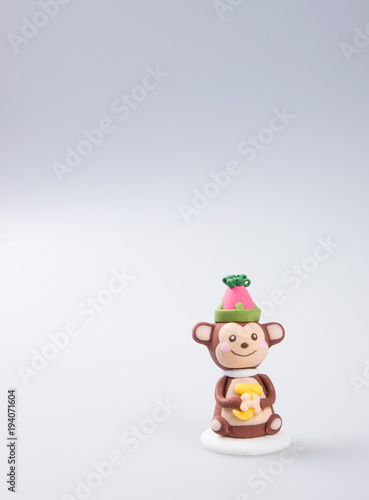 cake decoration or homemade  monkey  cake decoration on a background.