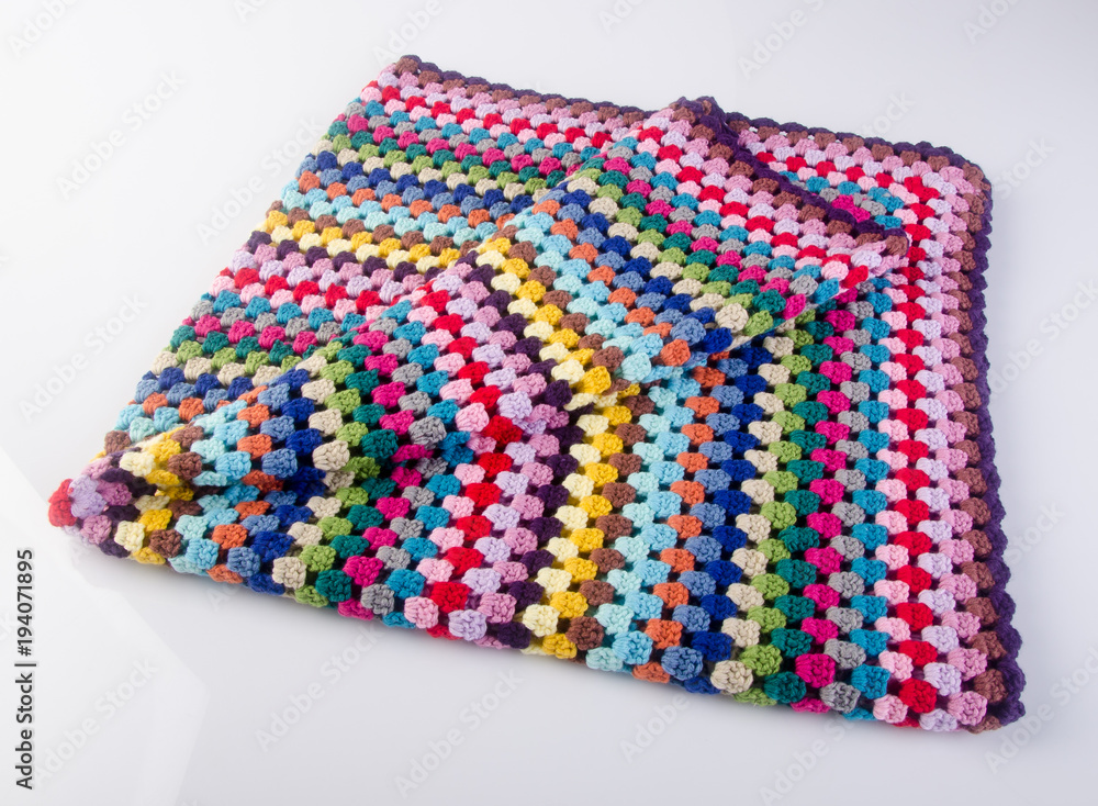 crochet or crochet blanket on a background.