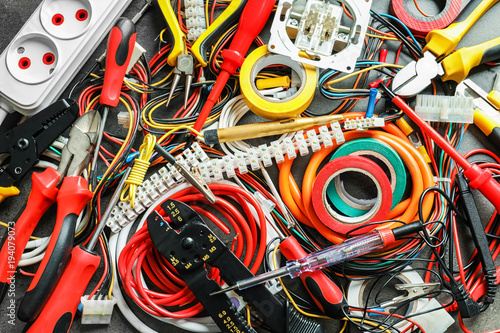 Different electrical tools on table