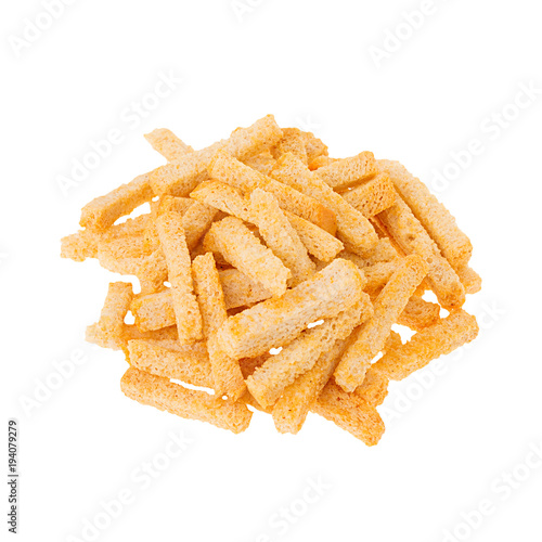 Heap crunchy wheat ruddy spicy sticks croutons isolated on white background. Fast food template for menu, advertising, cover.
