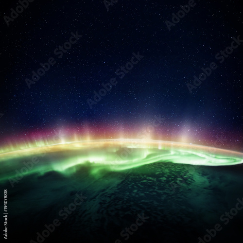 Fototapeta Naklejka Na Ścianę i Meble -  View of the planet Earth and Northern lights from space. Elements of this image furnished by NASA.