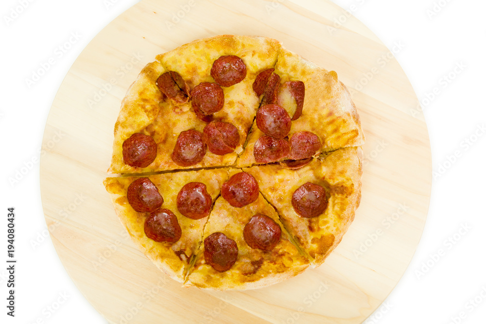 Top view of pepperoni pizza on wooden plate Top view of pepperoni pizza on wooden plate