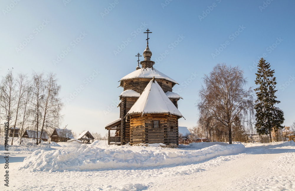 Winter landscape with old wooden Transfiguration Church in ancient Russian city of Suzdal