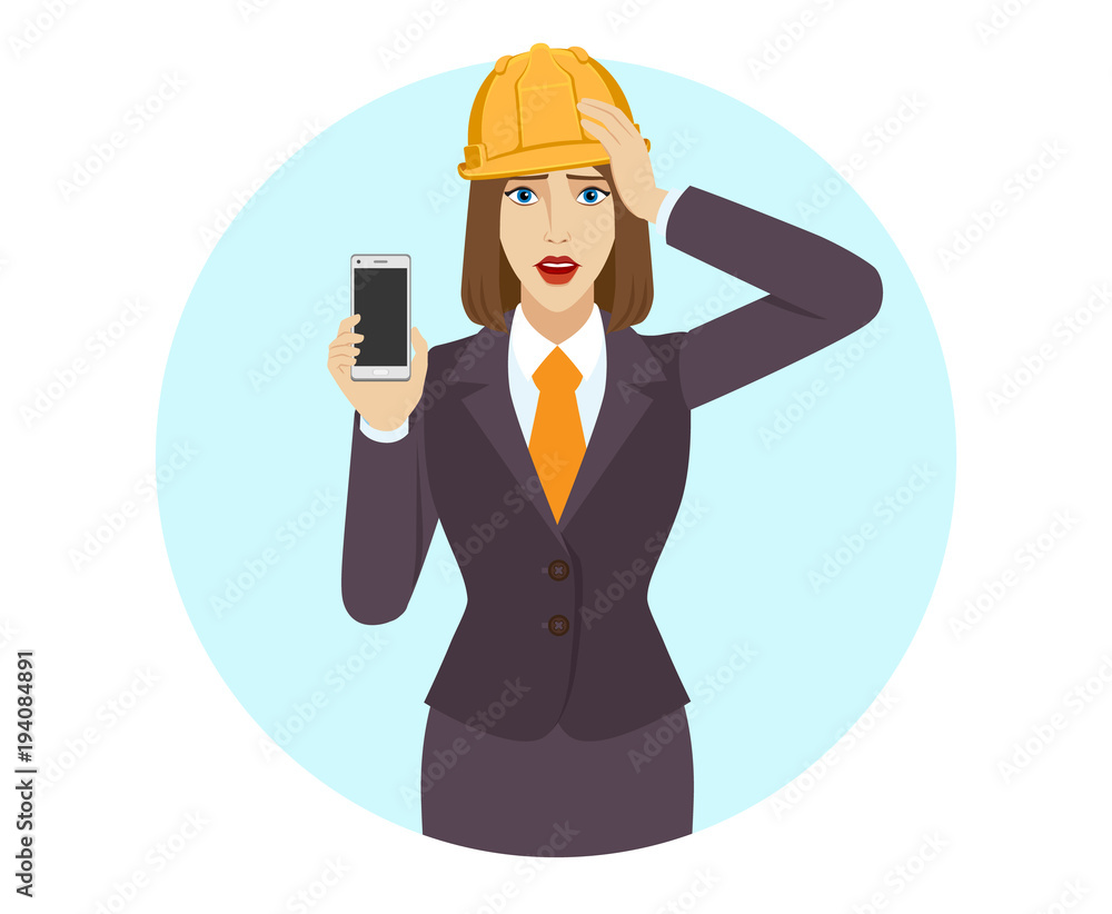 Businesswoman in construction helmet holding a mobile phone and grabbed his head Businesswoman in construction helmet holding a mobile phone and grabbed his head
