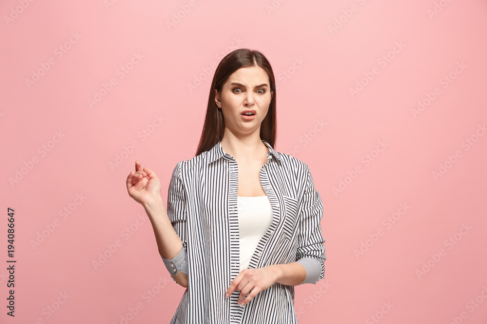 Young woman with disgusted expression repulsing something, isolated on the pink Young woman with disgusted expression repulsing something, isolated on the pink