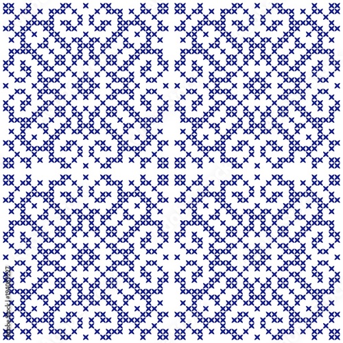 Embroidered ethnic ornament. Seamless cross stitch pattern. Vector illustration.