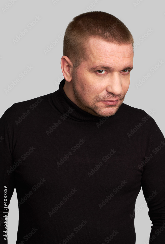 Obraz premium Serious man is wearing casual clothes.