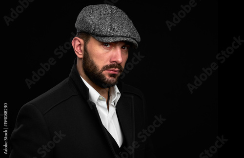 Bearded Man Wearing peaked cap