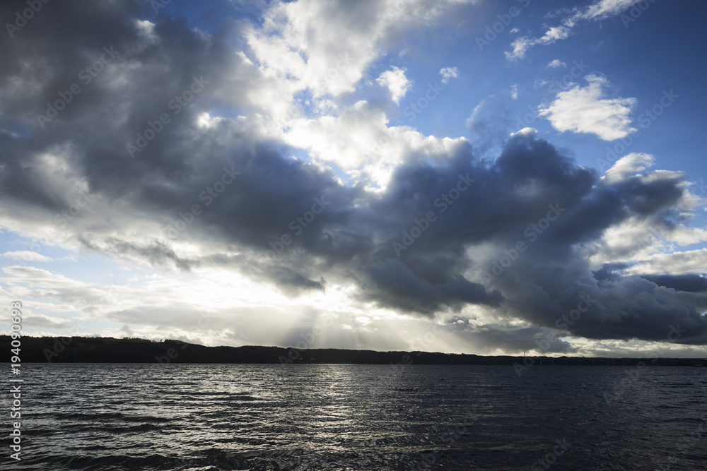 looking at the horizon by the sea with the sky full of clouds looking at the horizon by the sea with the sky full of clouds