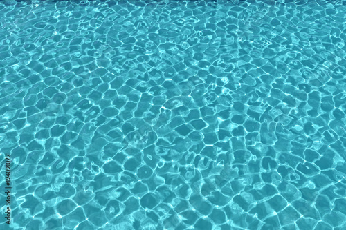 Clean blue swimming pool background. 3D Rendering