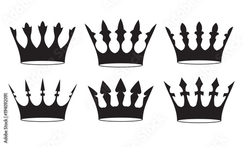 Set of four black crowns for heraldry design on white background.