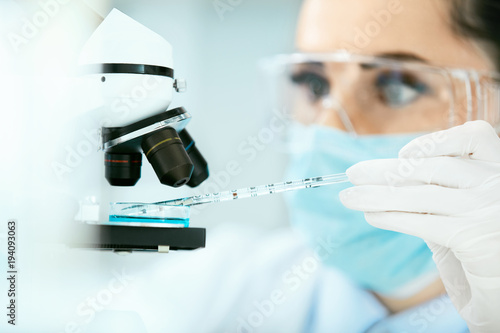 Medical Analysis. Female Scientist Doing Test In Laboratory