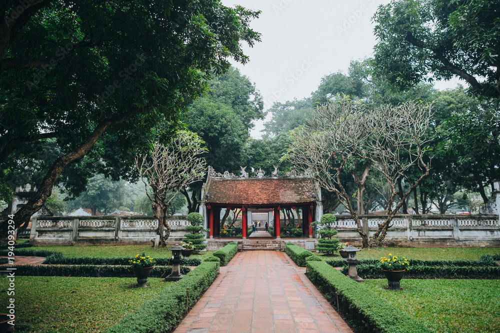 HANOI, VIETNAM - 03 JANUARY, 2018: architecture of traditional ancient building in green park, Hanoi, Vietnam HANOI, VIETNAM - 03 JANUARY, 2018: architecture of traditional ancient building in green park, Hanoi, Vietnam