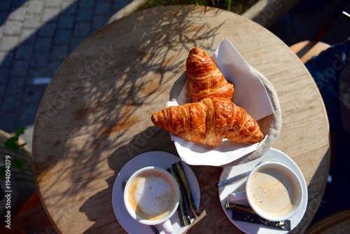 Coffee and croissants in Parisian bistro