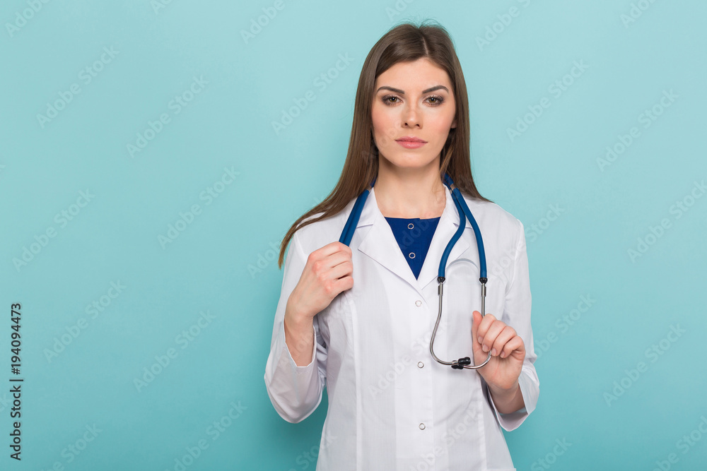 Attractive female doctor in white coat Attractive female doctor in white coat