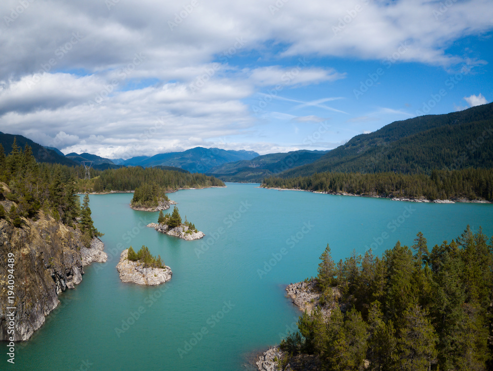 Aerial Drone picture of a beautiful lake in Canadian Mountain Landscape. Taken near Whistler and Squamish, BC, Canada.
