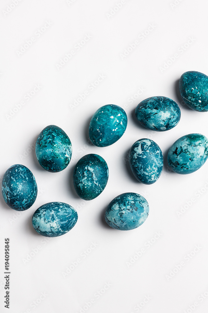 Easter eggs isolated painted by hand in blue color on white background Easter eggs isolated painted by hand in blue color on white background