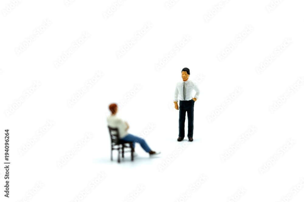 Miniature people : Man sitting a chair with businessman. Miniature people : Man sitting a chair with businessman.