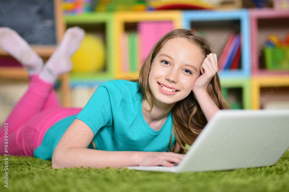girl using modern laptop girl using modern laptop