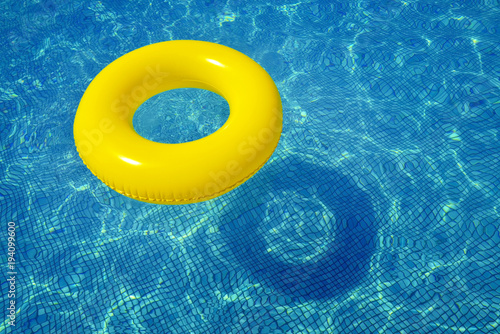 Colorful inflatable tube in swimming pool