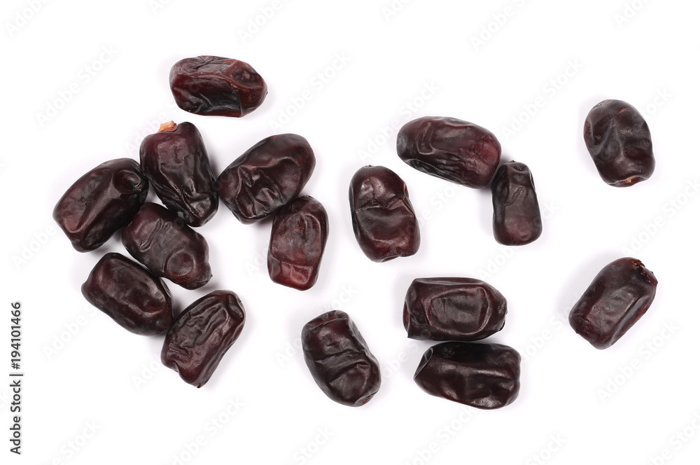 Pile dry dates isolated on white background, sweet fruit, top view Pile dry dates isolated on white background, sweet fruit, top view
