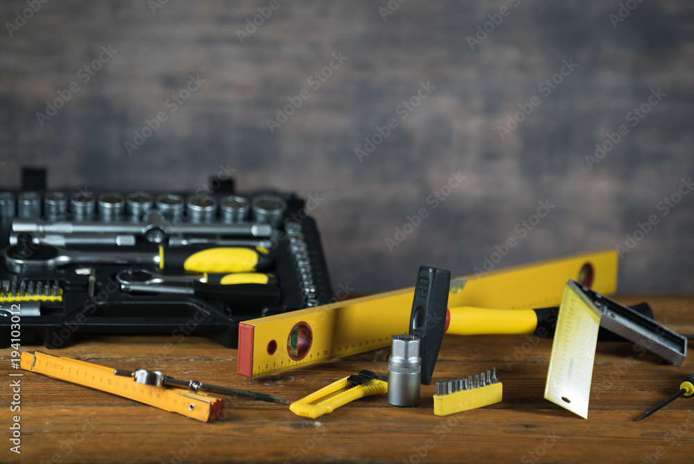 construction tooling on wooden board maintenance concept. construction tooling on wooden board maintenance concept.