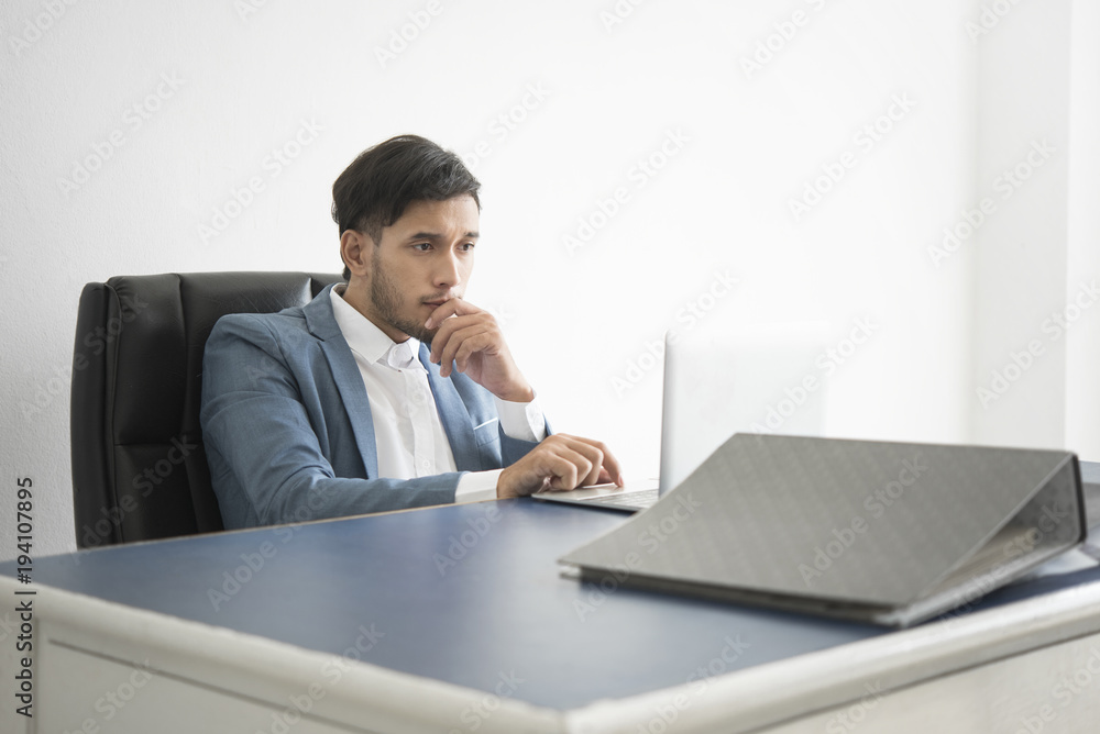 Businessman thinking idea something for work in office. Businessman thinking idea something for work in office.