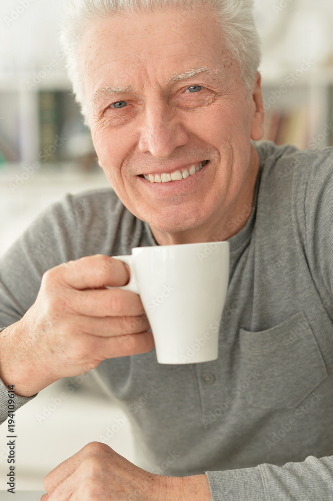 senior man drinking tea senior man drinking tea