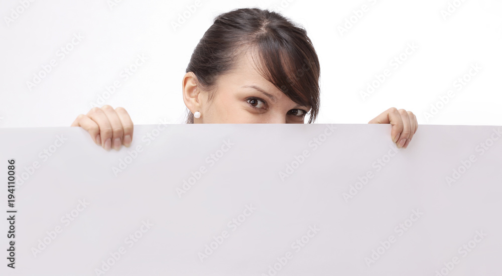 young business woman showing blank poster young business woman showing blank poster