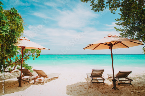 Fototapeta Naklejka Na Ścianę i Meble -  Beach chairs on tropical vacation