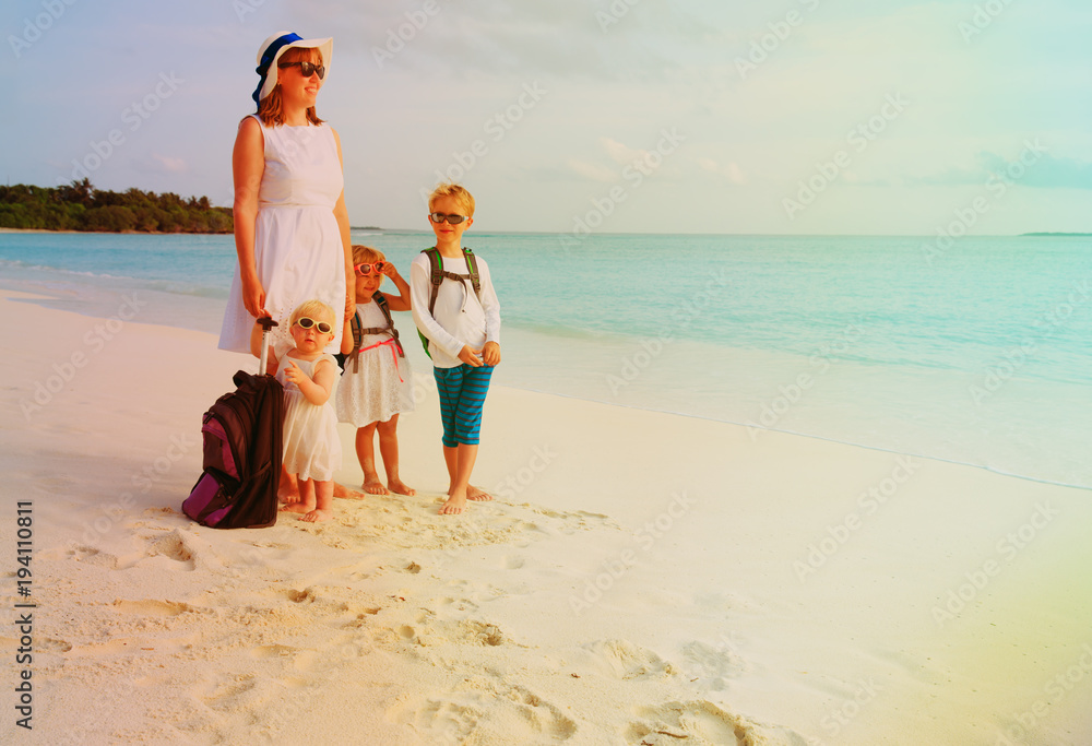 mother with kids travel on tropical beach mother with kids travel on tropical beach