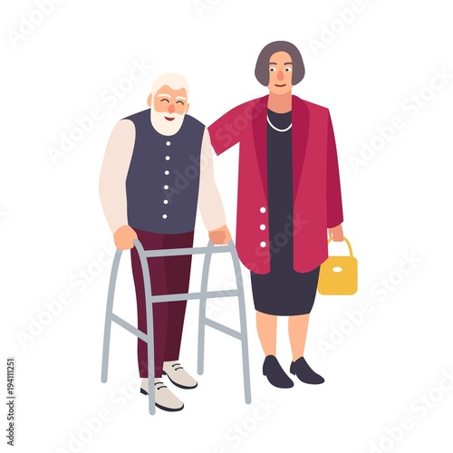 Old bearded man walking with walker and woman dressed in elegant clothing sup...