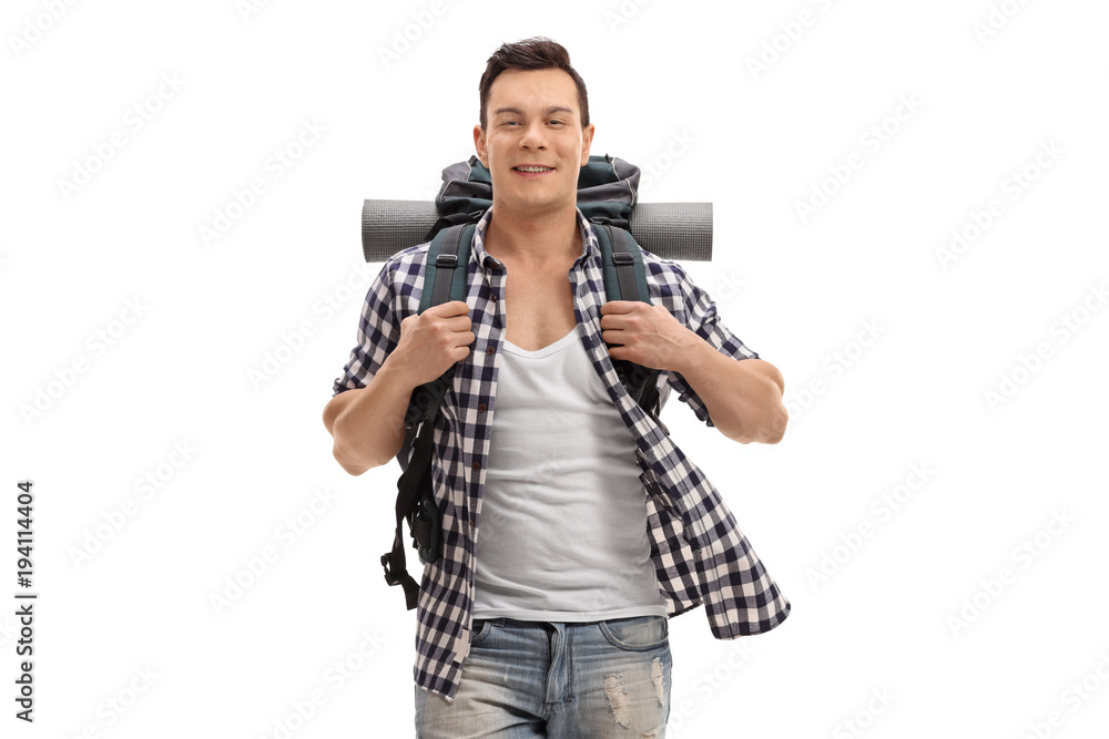Young hiker looking at the camera and smiling Young hiker looking at the camera and smiling