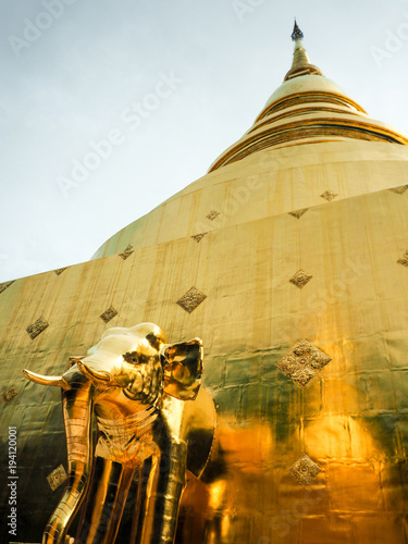 Golden elephant at traditional building photo