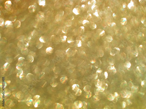 Abstract golden blurred sparkling glitter background