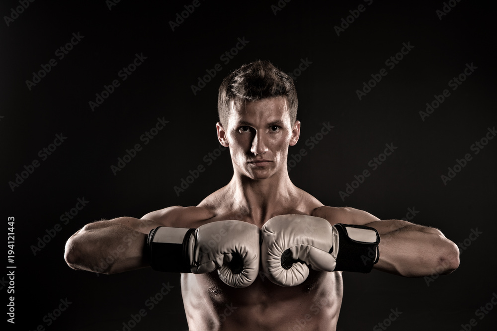 Boxer with strong hands ready to fight