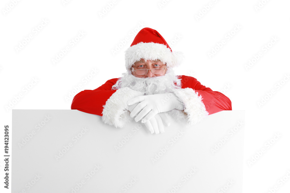 Santa Claus pointing in white blank sign with smile, isolated on white background