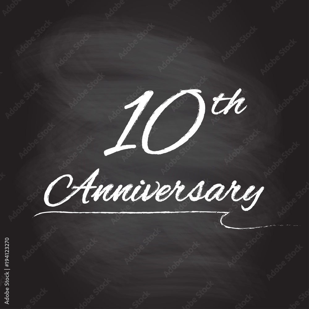 10th anniversary emblem hand drawn by chalk. 10 years celebration isolated on blackboard background. Vector illustration.