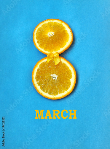 Women's Day, two slices of orange, yellow ribbon bow