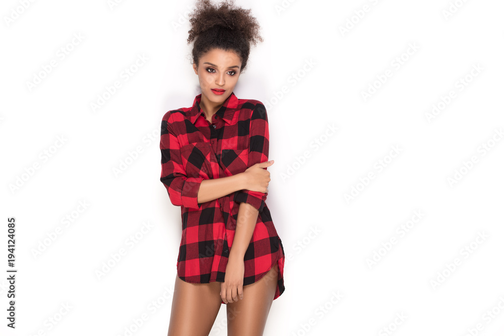 Afro girl in red checkered shirt. Afro girl in red checkered shirt.