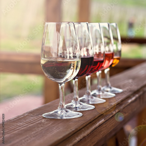 Glasses with wine. Red, pink, white wine in glasses.