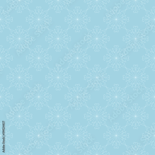 White floral seamless pattern on blue background