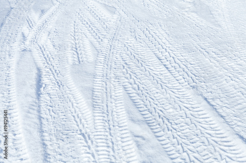 Tire tracks pattern on winter road