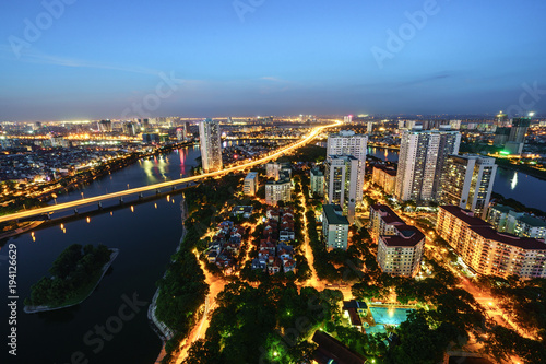 Aerial skyline view of Hanoi cityscape at twilight. Linh Dam peninsula, Hoang Mai district, Hanoi, Vietnam