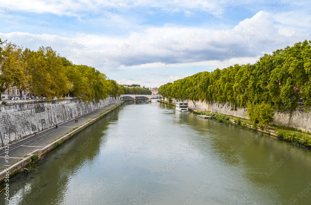 View of Tiber river from bridge in Rome