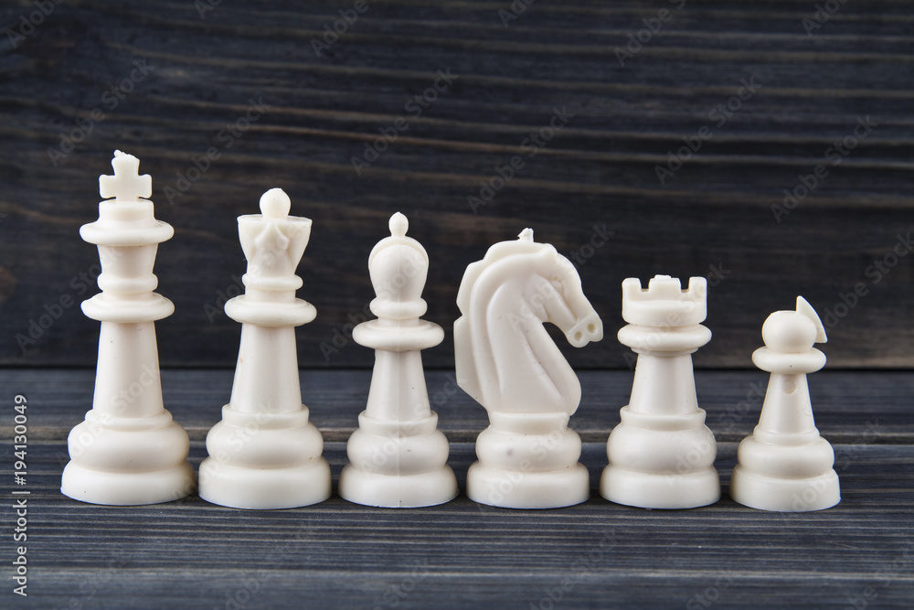chess isolated on a wooden background chess isolated on a wooden background