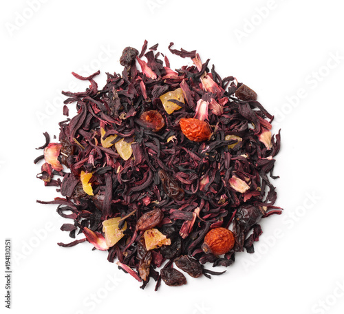 Top view of organic herbal tea with fruits and flowers