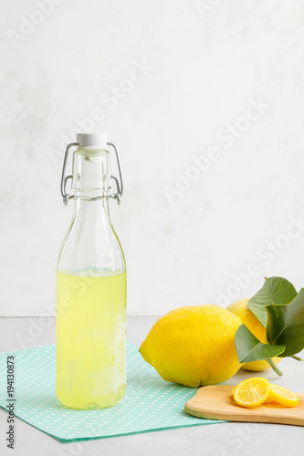llemonade on a light background. summer traditional Italian home-made drink from Sicilian lemons. a drink of yellow color. articles made of fruits. summer background with a picture of a drink