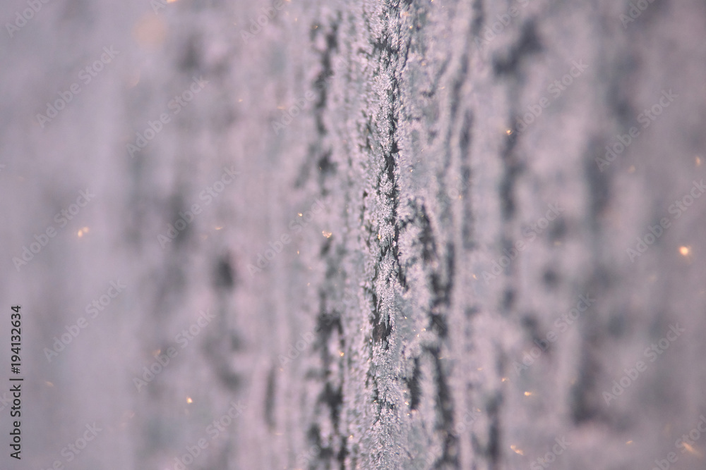 Snowflakes on glass. White color. Brilliant texture Snowflakes on glass. White color. Brilliant texture