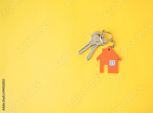 House on yellow background.